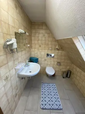 Ein Badezimmer in der Unterkunft Ferienwohnung Altrip