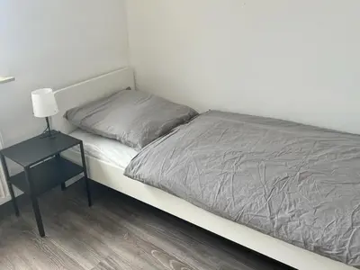 Ein Bett oder Betten in einem Zimmer der Unterkunft Monteur- und Arbeiterunterkunft Adlerstraße