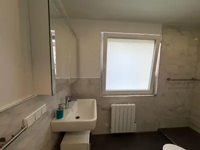 Ein Badezimmer in der Unterkunft Zimmer mit gemeinschaftsbad