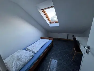 Ein Bett oder Betten in einem Zimmer der Unterkunft Comfort Apartments Heilbronn Kreuzgrund