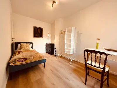 Ein Bett oder Betten in einem Zimmer der Unterkunft Renovierte Remise mit 3 Schlafzlmmern