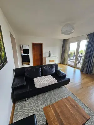 Ein Sitzbereich in der Unterkunft Ferienwohnung Sieben Raben