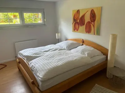 Ein Bett oder Betten in einem Zimmer der Unterkunft Jagstidyll bei Heilbronn Audi Lidl