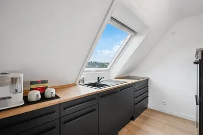 Küche/Küchenzeile in der Unterkunft Malu Rooms - Top Lage, Kostenloser Parkplatz, Klima, Netflix, 24h Checkin