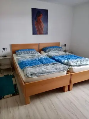 Ein Bett oder Betten in einem Zimmer der Unterkunft Ferienwohnung Karolus