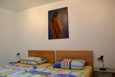 Ein Bett oder Betten in einem Zimmer der Unterkunft Ferienwohnung Karolus