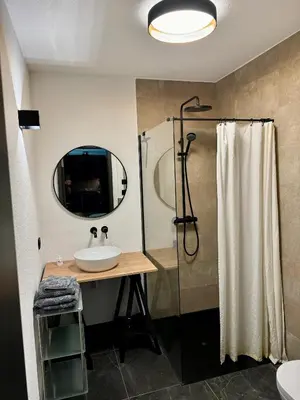 Ein Badezimmer in der Unterkunft theLOFT