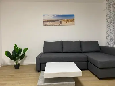 Ein Sitzbereich in der Unterkunft Sunny Suite mit Balkon - Küche - Bad