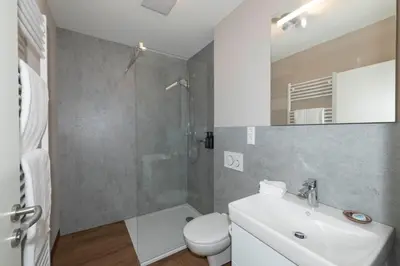 Ein Badezimmer in der Unterkunft Ada's Buka Chalet auf dem Felsberg