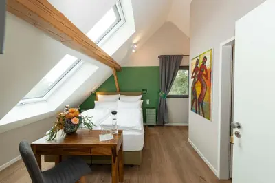 Ein Bett oder Betten in einem Zimmer der Unterkunft Ada's Buka Chalet auf dem Felsberg