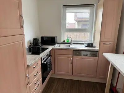 Küche/Küchenzeile in der Unterkunft Hyra Living- Apartment in Ilsfeld nahe A81