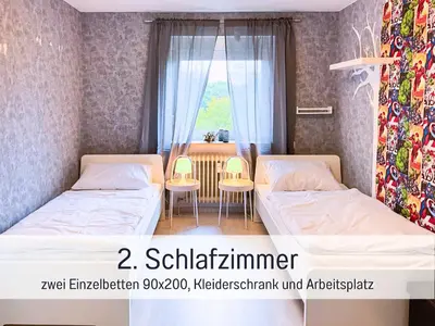 Ein Bett oder Betten in einem Zimmer der Unterkunft Casa Michaela Öhringen - wunderschöne Aussicht - Top für Familien und Geschäftsreisen, super ausgestattet