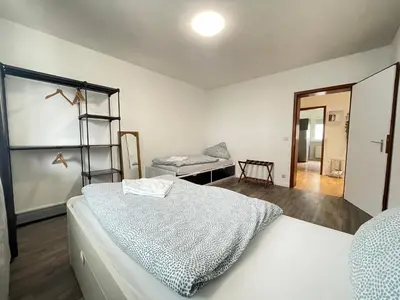 Ein Bett oder Betten in einem Zimmer der Unterkunft 6-Bett-Wohnung Delux Leonberg