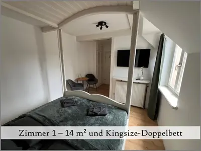 Ein Bett oder Betten in einem Zimmer der Unterkunft Gästehaus Reibold