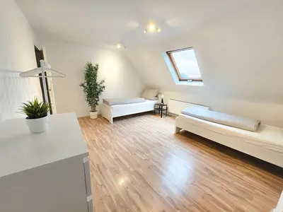 Ein Bett oder Betten in einem Zimmer der Unterkunft Chic Apartments in idyllic location