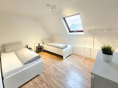 Ein Bett oder Betten in einem Zimmer der Unterkunft Chic Apartments in idyllic location