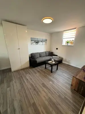 Ein Sitzbereich in der Unterkunft Ferienwohnung in der Südpfalz