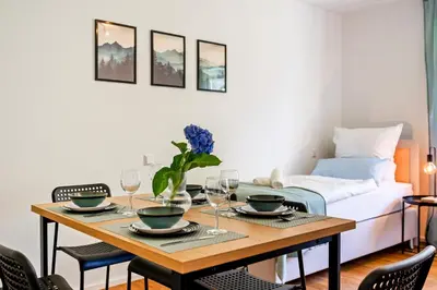 Ein Bett oder Betten in einem Zimmer der Unterkunft 3BR - Apartment am Theater