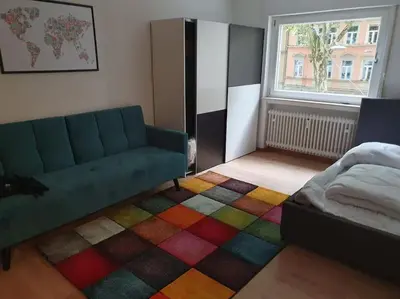 Ein Bett oder Betten in einem Zimmer der Unterkunft Gemütliche 3-Zimmer-Wohnung mit TG-Stellplatz - Top-Lage in Karlsruhe