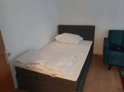Ein Bett oder Betten in einem Zimmer der Unterkunft Gemütliche 3-Zimmer-Wohnung mit TG-Stellplatz - Top-Lage in Karlsruhe