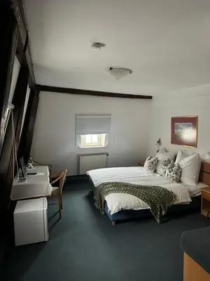 Ein Bett oder Betten in einem Zimmer der Unterkunft Frida Cantina Y Bar I Hotel