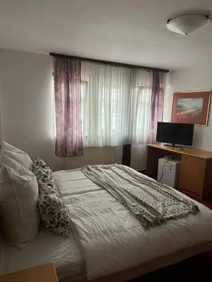 Ein Bett oder Betten in einem Zimmer der Unterkunft Frida Cantina Y Bar I Hotel