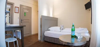 Ein Bett oder Betten in einem Zimmer der Unterkunft Friedrich von Schiller Hotel