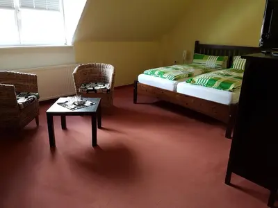 Ein Bett oder Betten in einem Zimmer der Unterkunft Hotel Zum Schwanen