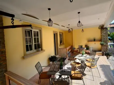 Ein Sitzbereich in der Unterkunft Gästehaus & Weingut GEHRIG