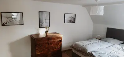 Ein Bett oder Betten in einem Zimmer der Unterkunft Haus Helga