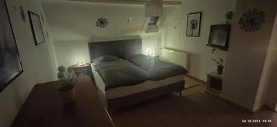 Ein Bett oder Betten in einem Zimmer der Unterkunft Haus Helga
