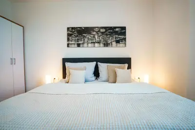 Ein Bett oder Betten in einem Zimmer der Unterkunft Hotel am Schafbaum