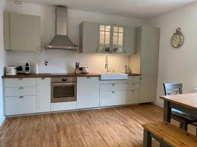 Küche/Küchenzeile in der Unterkunft Ferienhaus Leon im Schloss und Hofgut Langenzell