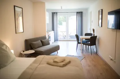 Ein Sitzbereich in der Unterkunft HUGOS Studio Apartment