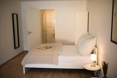 Ein Bett oder Betten in einem Zimmer der Unterkunft HUGOS Studio Apartment