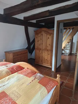 Ein Bett oder Betten in einem Zimmer der Unterkunft Ferienwohnungen Haus Ruth