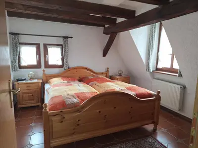 Ein Bett oder Betten in einem Zimmer der Unterkunft Ferienwohnungen Haus Ruth