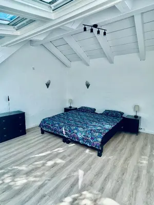 Ein Bett oder Betten in einem Zimmer der Unterkunft Penthouse Overlooking the Neckar