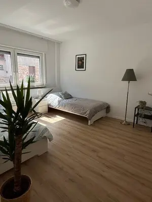 Ein Bett oder Betten in einem Zimmer der Unterkunft Monteur- und Ferienunterkunft Wilhelmsfeld & Heidelberg