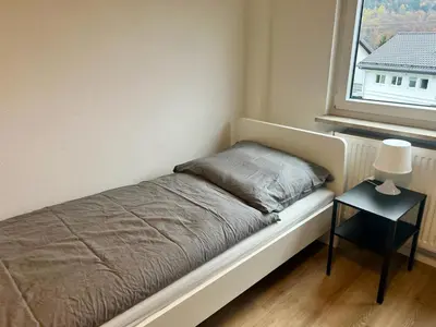 Ein Bett oder Betten in einem Zimmer der Unterkunft Monteur- und Ferienunterkunft Wilhelmsfeld & Heidelberg