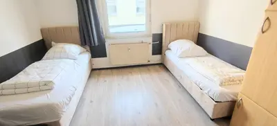 Ein Bett oder Betten in einem Zimmer der Unterkunft Haus66