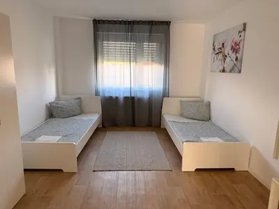 Ein Bett oder Betten in einem Zimmer der Unterkunft Ferienwohnung Marktplatz