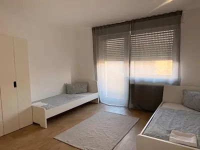 Ein Bett oder Betten in einem Zimmer der Unterkunft Ferienwohnung Marktplatz