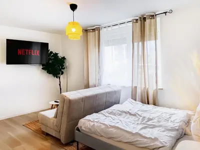Ein Bett oder Betten in einem Zimmer der Unterkunft Cozy Studi Apartment - Kaiserslautern