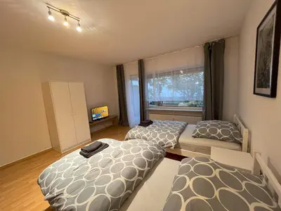 Ein Bett oder Betten in einem Zimmer der Unterkunft Arrive & Relax Darmstadt Whg 3