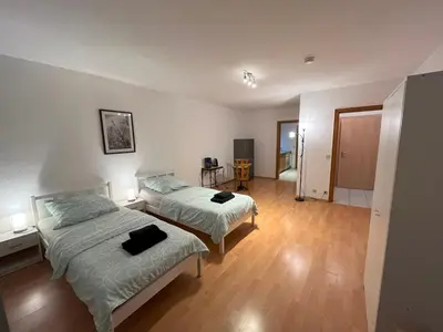 Ein Bett oder Betten in einem Zimmer der Unterkunft Arrive & Relax Darmstadt Whg 3