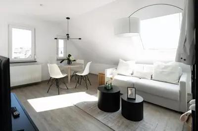 Ein Sitzbereich in der Unterkunft Maisonette - Stilvoll und Ruhig, Urban Design, Yoga