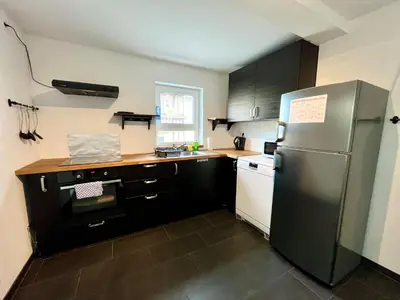 Küche/Küchenzeile in der Unterkunft Ganze Wohnung - Parkplatz - Wi-fi - Küche - Balkon