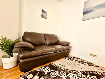 Ein Sitzbereich in der Unterkunft Work & Stay Apartment in Biebelnheim