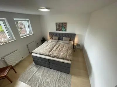 Ein Bett oder Betten in einem Zimmer der Unterkunft Villa Residenz